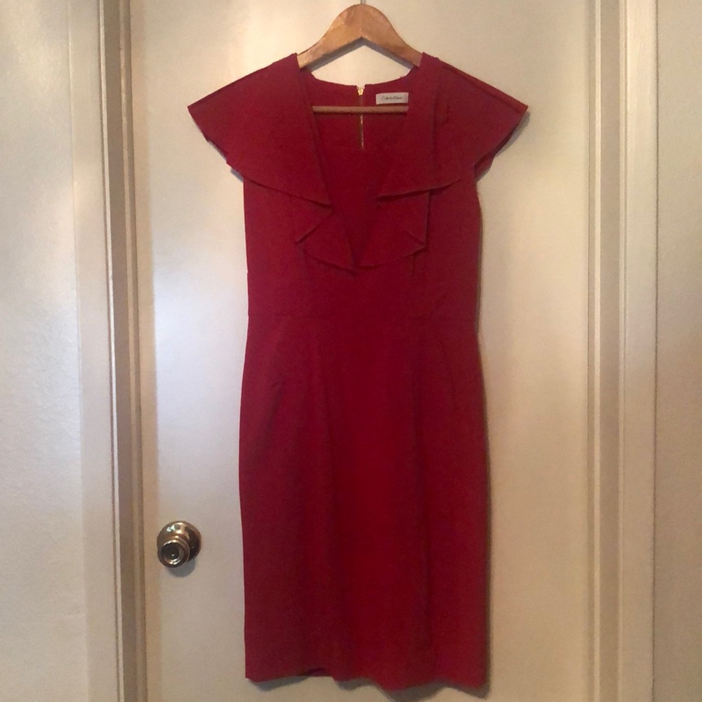 Calvin Klein’s red dress